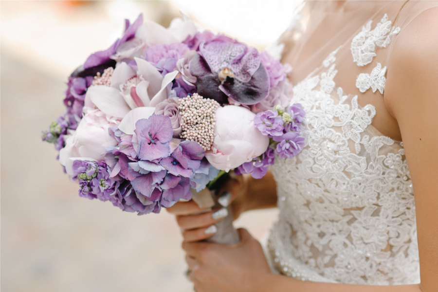 Bride with a purple bouquet