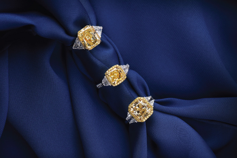 Three stunning yellow diamond rings